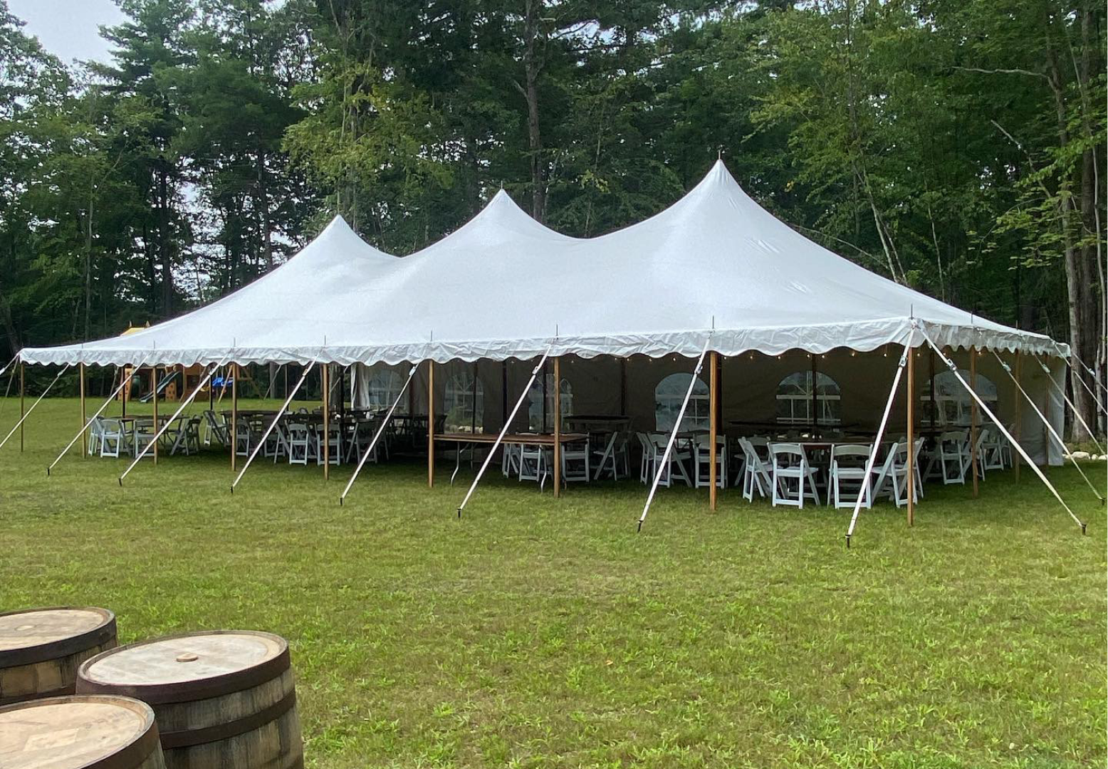 White tent with barrel